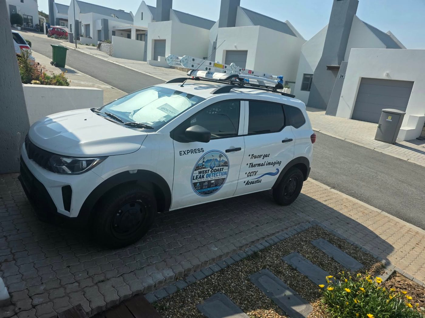 West Coast Leak Detection branded white Renault service vehicle